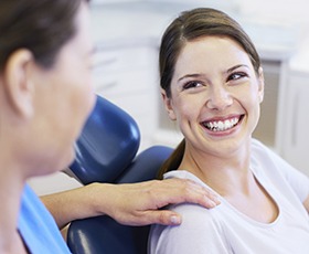 Smiling woman in dental chair