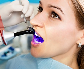 A woman getting dental bonding
