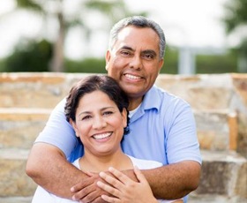 An older couple smiling