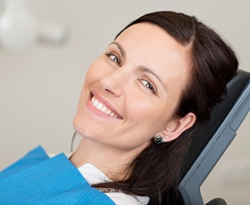 Smiling woman in dental chair