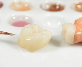 Dental crown restoration prior to placement
