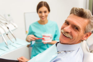 Dentist and smiling patient