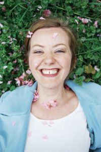 Smiling woman with gaps between front teeth