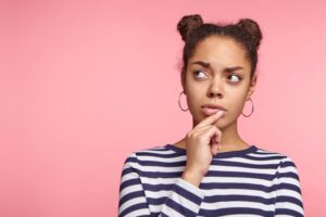 Woman wondering if she needs a new dental crown